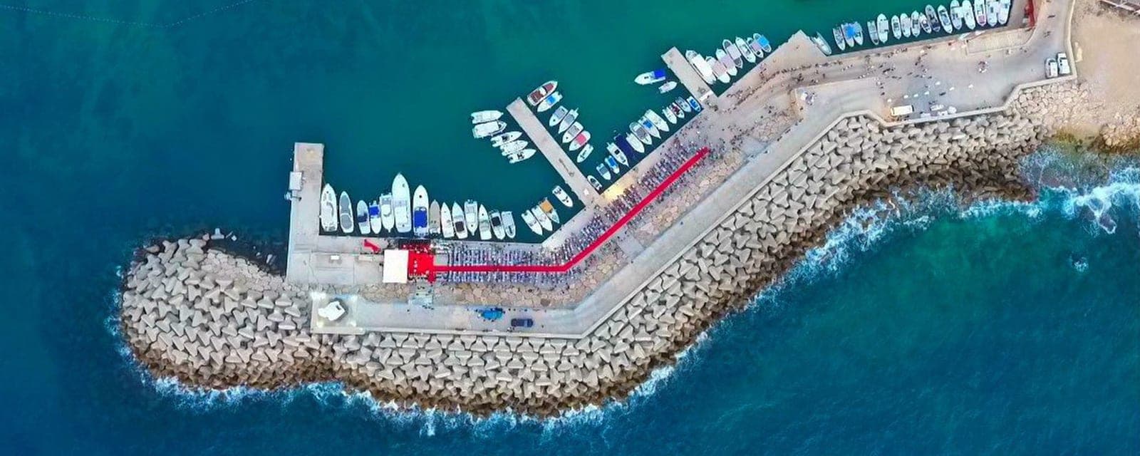 Aerial view of the Amchit boulevard and marina.