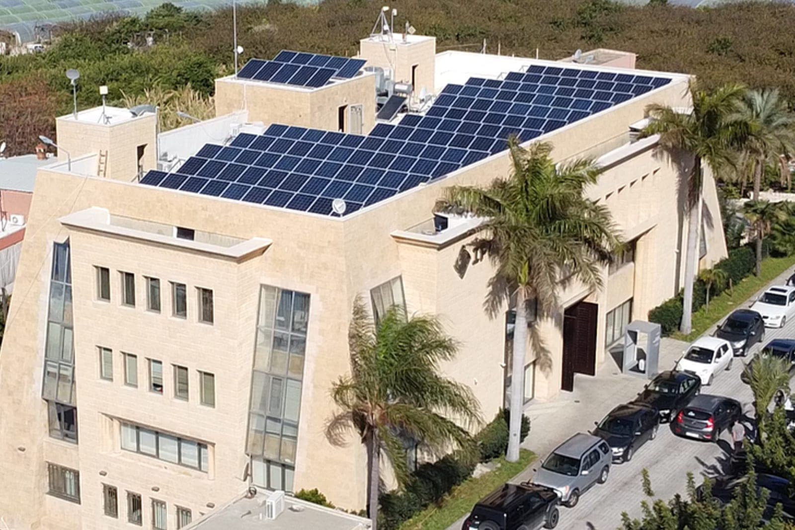 Rooftop solar panels on an ISSA Group building.